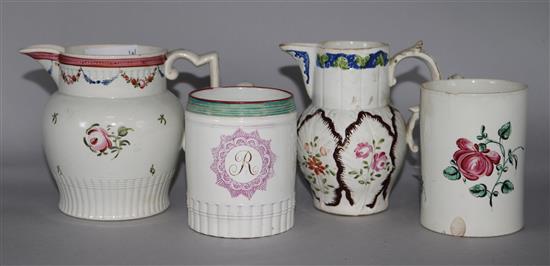 Two polychrome pearlware jugs and two similar mugs, c.1790-1800